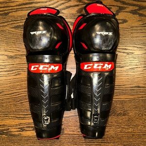 CCM hockey shin guards, adult size 14”, black and red